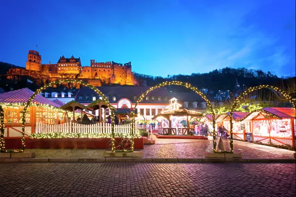 Christmas Market at Karlsplatz in the old town of Heidelberg, with Castle Heidelberg, Heidelberg, Baden-Wurttemberg, Germany, Europe