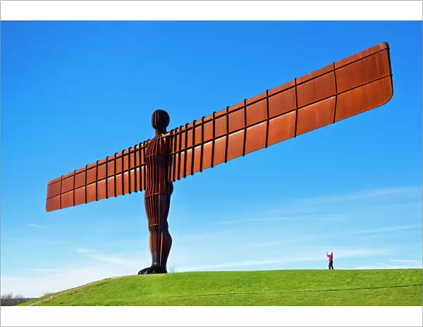 Person photographing the Angel of the North sculpture by Antony Gormley, Gateshead