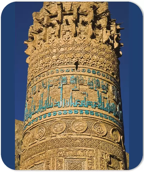 Detail of decoration on minaret including Kufic inscription in turquoise glazed tiles