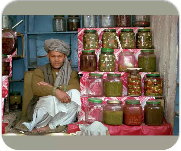 Portrait of a Pathan man at his stall selling pickles in Kabul, Afghanistan, Asia