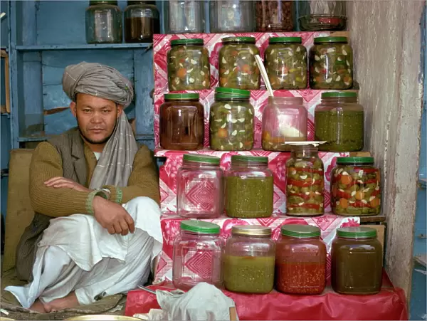 Portrait of a Pathan man at his stall selling pickles in Kabul, Afghanistan, Asia