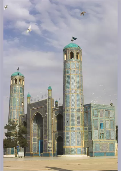 White pigeons fly around the shrine of Hazrat Ali, who was assassinated in 661