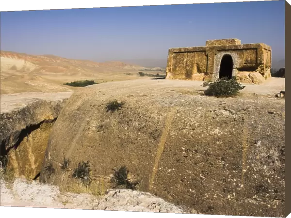 Buddhist stupa carved out of rock at Takht-I-Rustam (Rustams throne) an early burial mound that contained relics of the Buddha, part of a stupa-monastery complex dating from the Kushano-Sasanian period 4th-5th century AD, near Haibak, Samangan