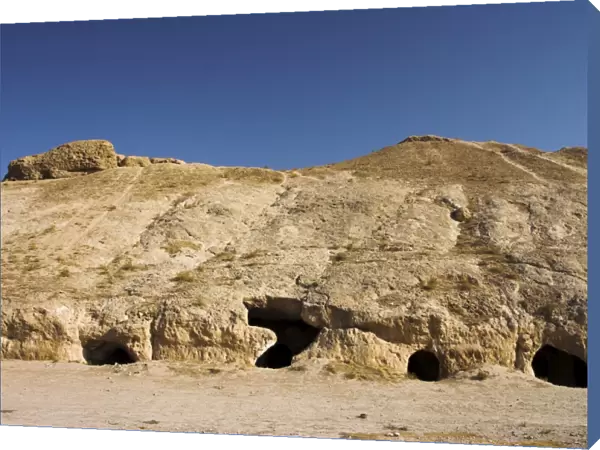 Buddhist caves, living quarters of the monks, in rock-carved stupa-monastery complex dating from the Kushano-Sasanian period, Takht-I-Rustam (Rustams Throne), near Haibak, Samangan Province