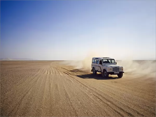 Four-wheel drive Landrover, off-roading in the desert, Algeria, Africa