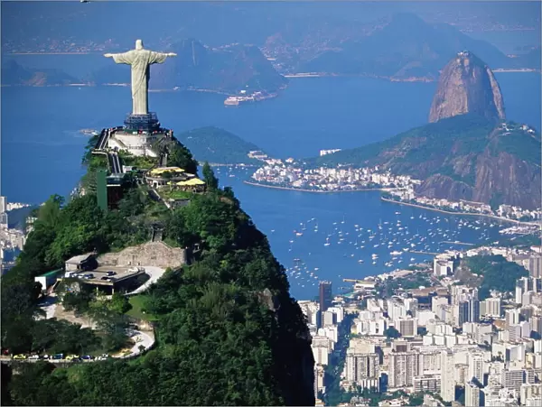 Statue of Christ the Redeemer overlooking city and Sugar Loaf mountain