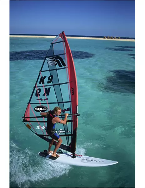British Windsurfing Champion Guy Cribb in calm waters of the Red Sea, Egypt
