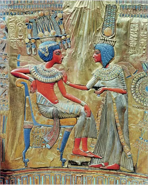 The back of the gold-plated throne, showing queen Ankhesenamun putting the finishing touches to the kings toilet, from the tomb of the pharoah Tutankhamun, discovered in the Valley of the Kings, Thebes, Egypt, North