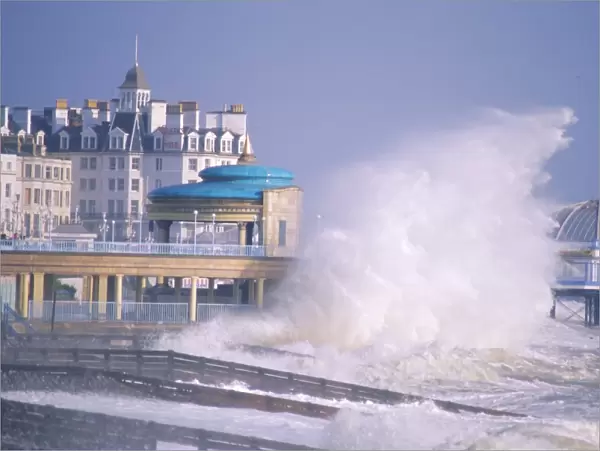 Waves pounding bandstand in a storm on the south coast, Eastbourne, East Sussex