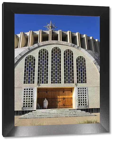 Pilgrim at doors of St. Mary of Zion new church, built by Haile Selassie in the 1960s