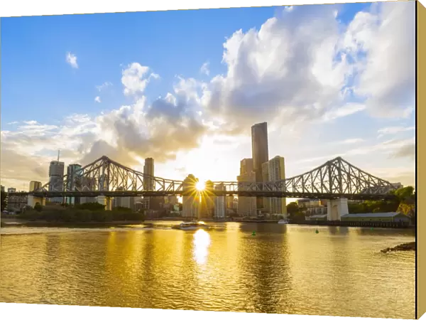 Sunset, Brisbane city with the sun hidden behind the Story Bridge, Brisbane, Queensland