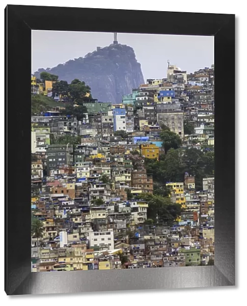 View of Rocinha favela (slum) (shanty town), Corcovado mountain and the statue of