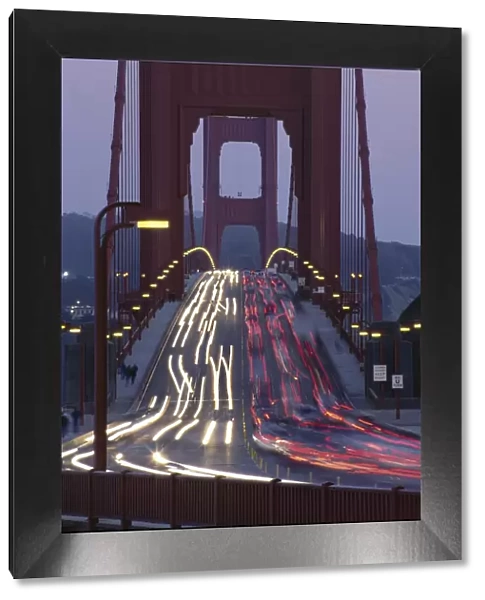 Traffic on the Golden Gate bridge at dusk
