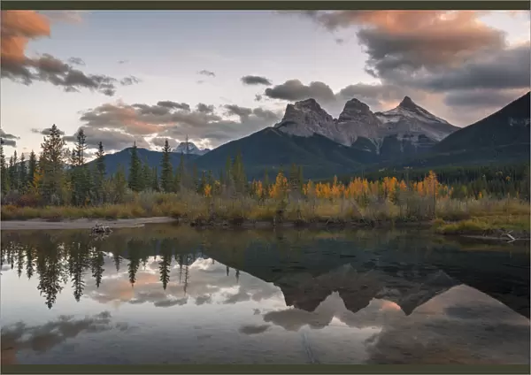 Sunset over Three Sisters in Autumn near Banff National Park, UNESCO World Heritage Site