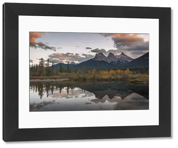 Sunset over Three Sisters in Autumn near Banff National Park, UNESCO World Heritage Site