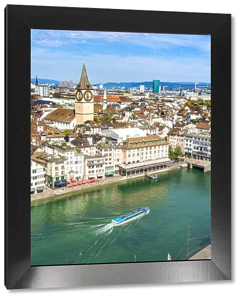 Elevated view of Limmat River and St. Peter church from tall towers of Grossmunster