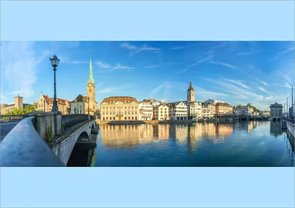 Panoramic of Fraumunster church and Limmat River seen from Munsterbrucke bridge at