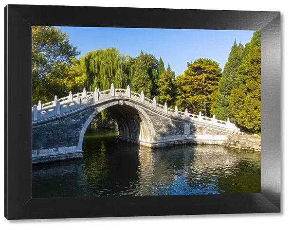 View of arched bridge on Kunming Lake at Yihe Yuan, The Summer Palace, UNESCO World