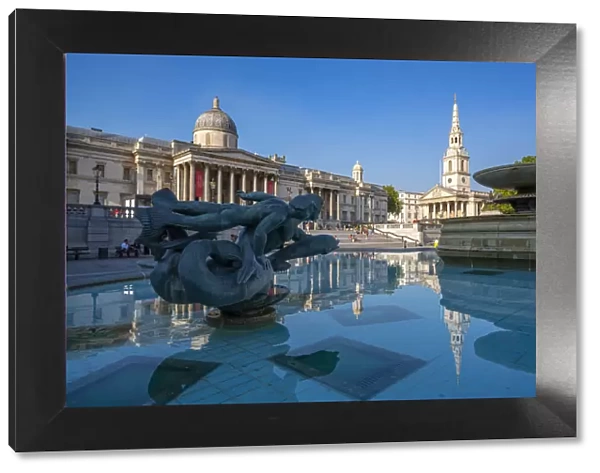 View of The National Gallery and fountains in Trafalgar Square, Westminster, London
