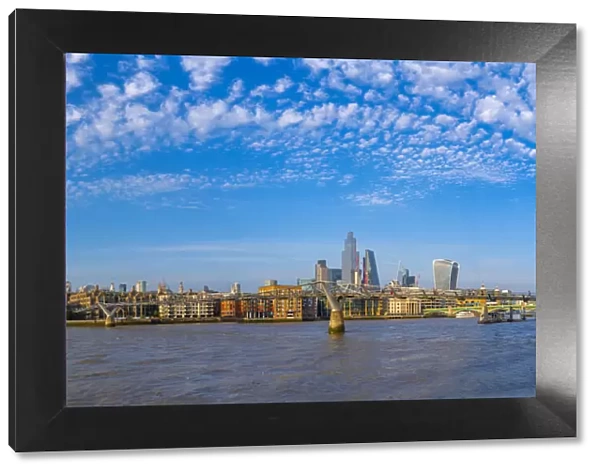 View of St. Pauls Cathedral, River Thames and City of London skyline, London