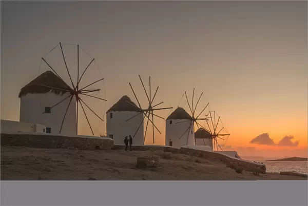 View of the windmills in Mykonos Town at sunset, Mykonos, Cyclades Islands, Greek Islands