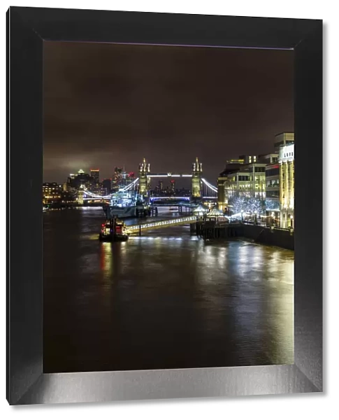 Tower Bridge and HMS Belfast on River Thames at night, London, England, United Kingdom, Europe