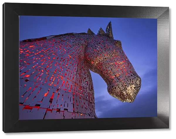 One of the two Kelpies sculptures at night, near Falkirk, Stirlingshire, Scotland, United Kingdom, Europe