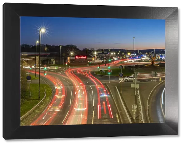View of trail lights on Hornsbridge Roundabout at dusk, Chesterfield, Derbyshire, England, United Kingdom, Europe