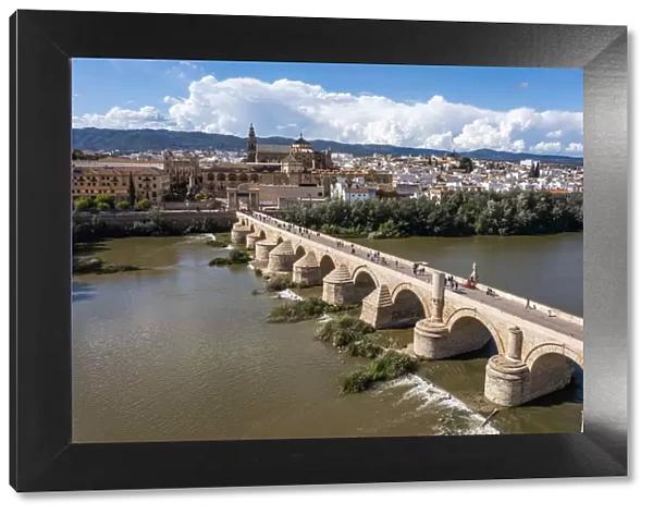 Aerial of the Historic Roman Bridge over the Guadalquivir River, UNESCO World Heritage Site, Cordoba, Andalusia, Spain, Europe