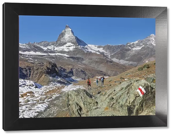Hikers on Gornergrat, Matterhorn Peak, 4478m, Zermatt, Valais, Swiss Alps, Switzerland, Europe