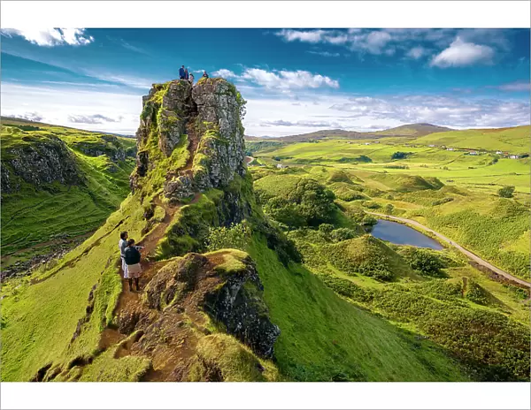 Tourists explore Fairy Glenn, Isle of Skye, Inner Hebrides, Scotland, United Kingdom, Europe