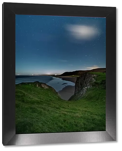 Worms Head and Rhossili beach under moonlight, Gower, South Wales, United Kingdom, Europe