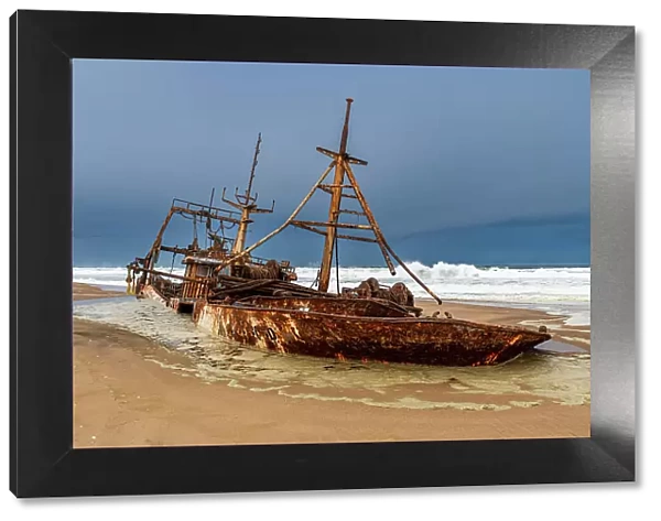 Shipwreck on a beach in the Iona National Park, Namibe, Angola, Africa
