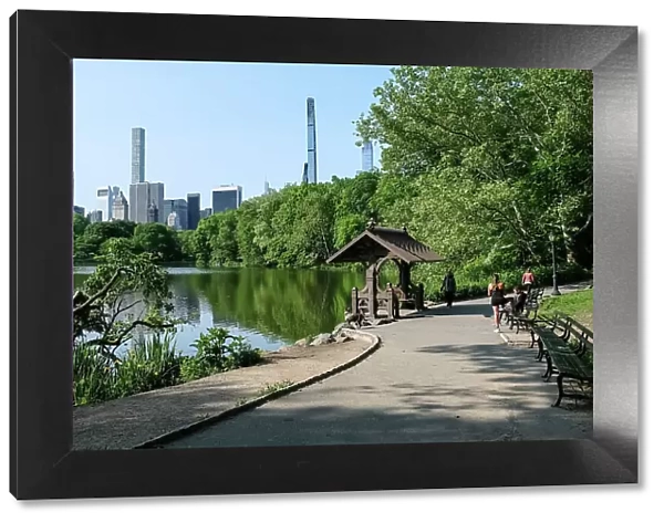 New York City cityscape viewed from The Lake, Central Park's largest body of water after the Reservoir, Central Park, Manhattan, New York City, United States of America, North America