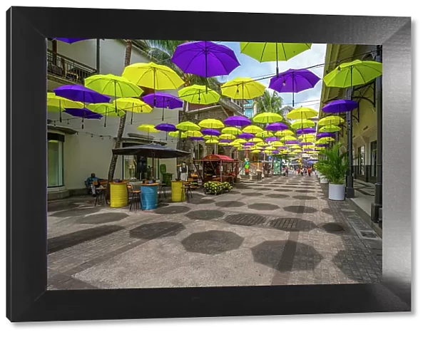 View of umbrellas and shops at Caudan Waterfront in Port Louis, Port Louis, Mauritius, Indian Ocean, Africa