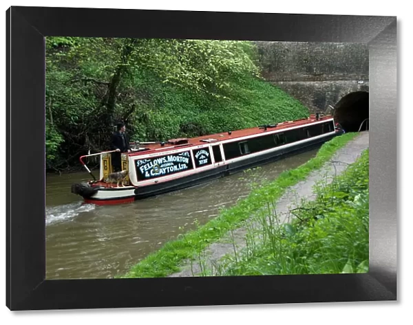 Narrow boat entering a tunnel, Llangollen Canal, England, United Kingdom, Europe