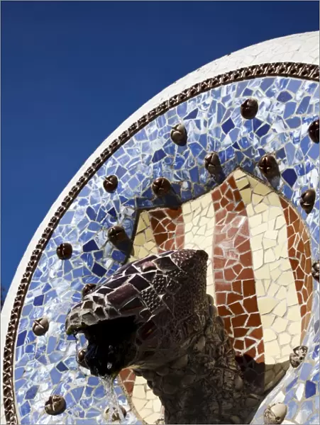 Fountain decorated with mosaics at the entrance to Parc Guell, Barcelona