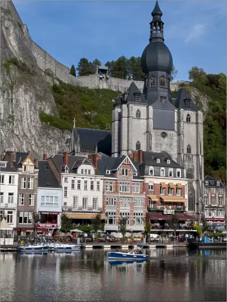 View across River Meuse showing Collegiate Church of Notre-Dame, Dinant, Wallonia, Belgium, Europe