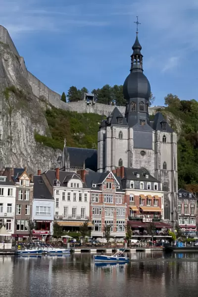 View across River Meuse showing Collegiate Church of Notre-Dame, Dinant, Wallonia, Belgium, Europe