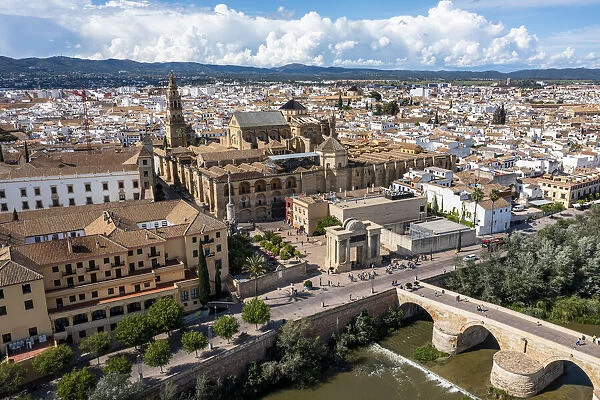 Aerial of the Historic Roman Bridge and Mezquita, UNESCO World Heritage Site, Cordoba, Andalusia, Spain, Europe