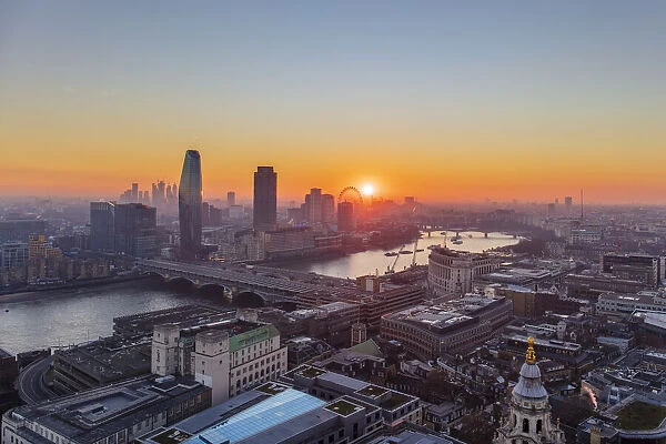 Aerial view of London skyline and River Thames at sunset taken from St. Pauls Cathedral, London, England, United Kingdom, Europe