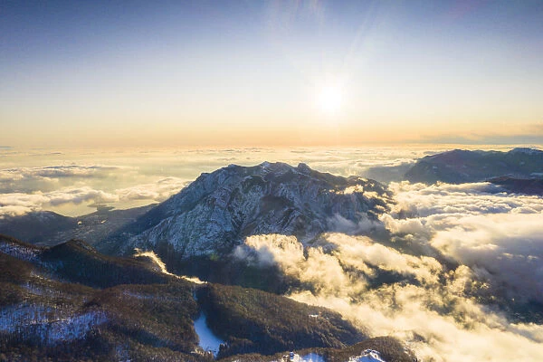 Aerial view of Monte Coltignone in a sea of clouds seen from Piani Resinelli, Lake Como
