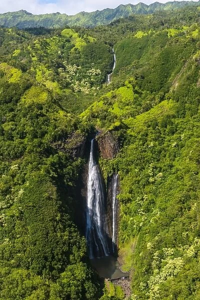 Aerial of a waterfall in the interior of Kauai, Hawaii, United States of America, Pacific