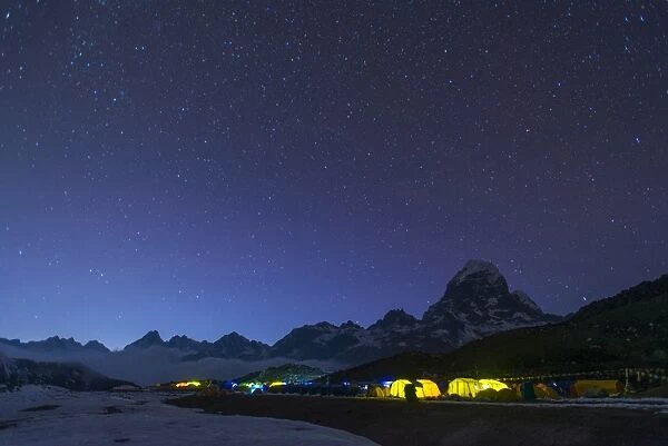 Ama Dablam base camp in the Everest region glows at twilight, Himalayas, Nepal, Asia