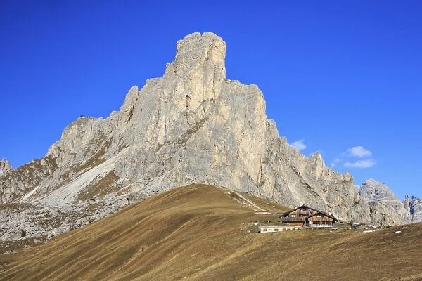 Autumnal view of the high rocky peak of Ra Gusela from Falzarego Pass, Dolomites of Belluno