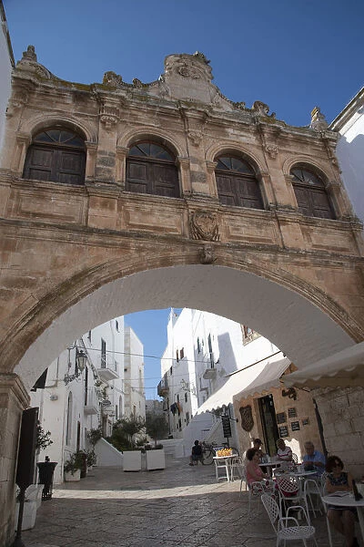 A Baroque style arch in the Centro Storico of the medieval city of Ostuni, Puglia, Italy