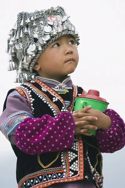 A boy dressed in Hani minority traditional clothing, Yuanyang, Yunnan Province