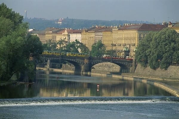 Bridge and weir on the River Vltava, Prague, Czech Republic, Europe