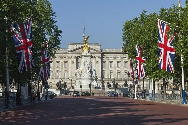Buckingham Palace down the Mall with Union Jack flags, London, England, United Kingdom, Europe