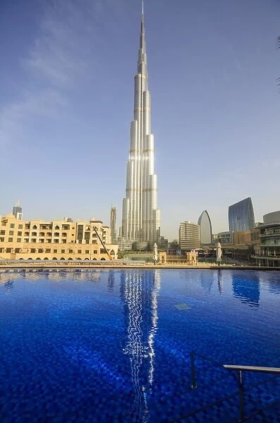 Burj Khalifa reflected in hotel swimming pool, Dubai, United Arab Emirates, Middle East